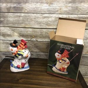 Night light snowman on skis